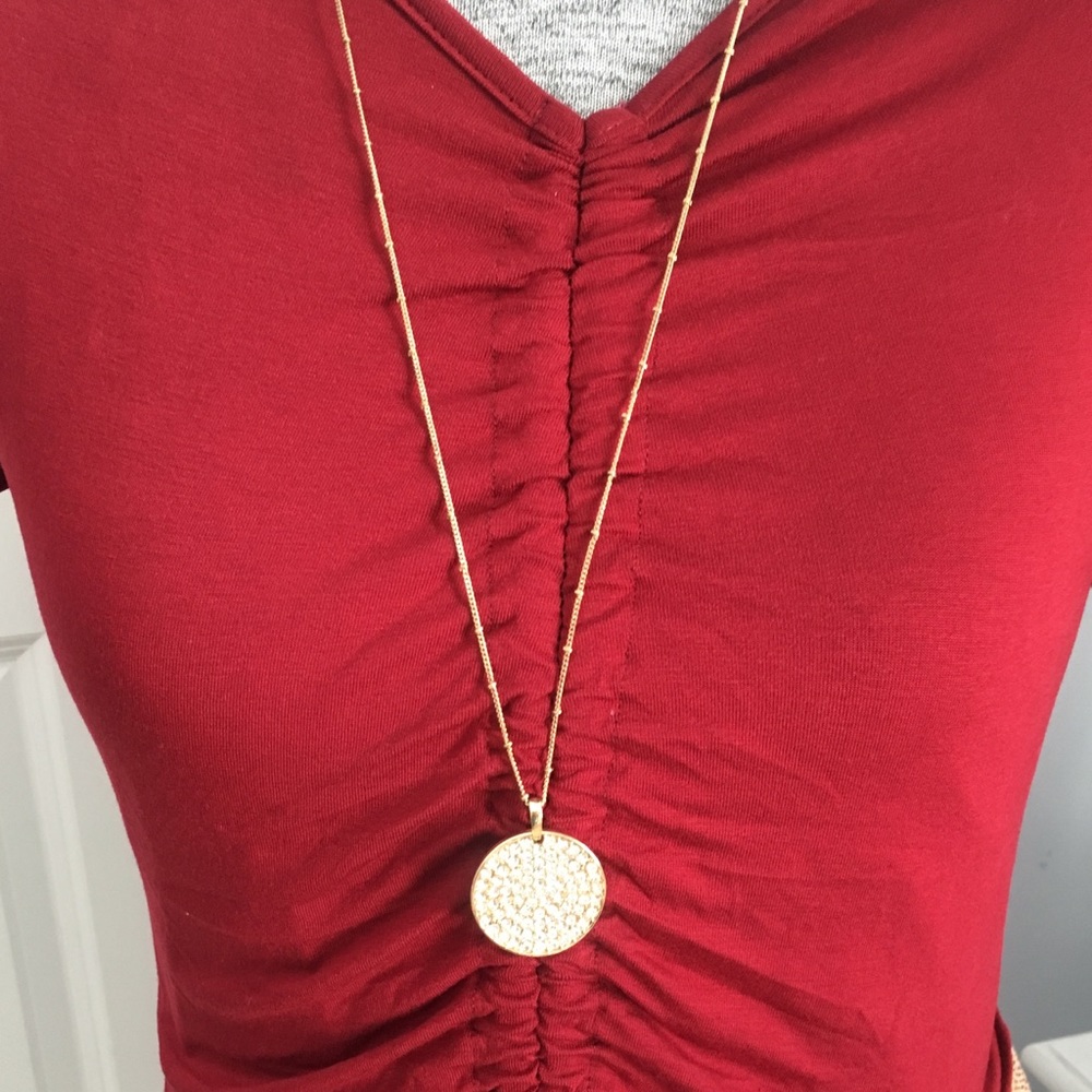 Long gold necklace